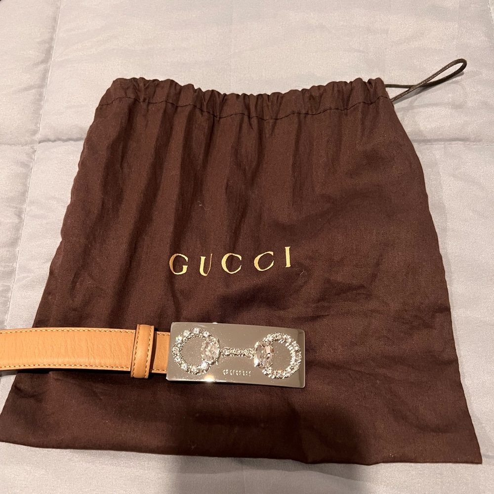 Stunning! Neutral tan and rhinestone Authentic Never worn Gucci belt.